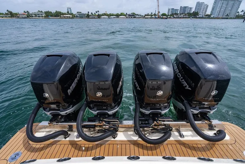  Yacht Photos Pics 2018 Scout 420 LXF boat with four Mercury outboard engines on water.