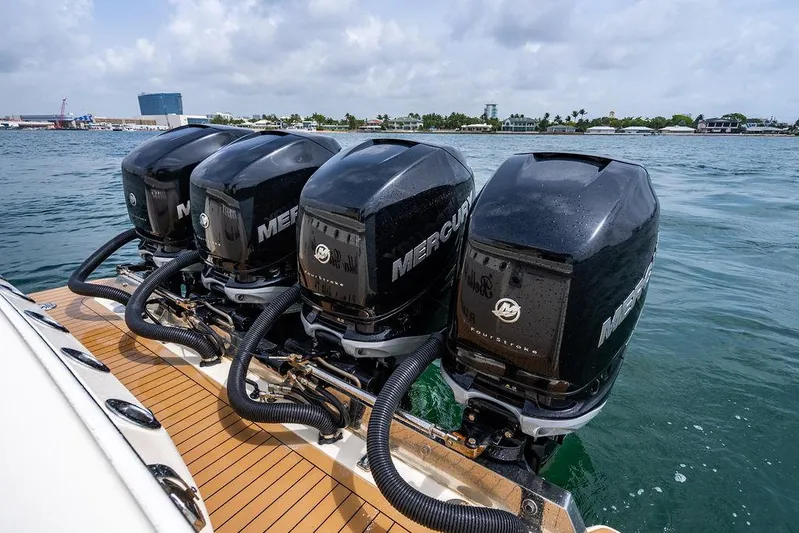  Yacht Photos Pics Four Mercury outboard engines on a 2018 Scout 420 LXF boat in the water.