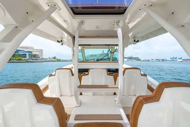  Yacht Photos Pics 2018 Scout 420 LXF boat interior with luxurious seating and ocean view.