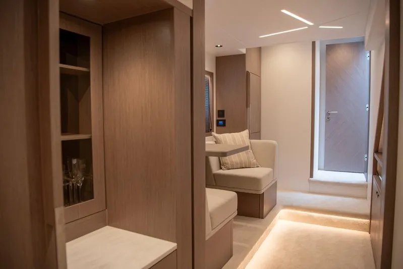  Yacht Photos Pics Luxurious interior of 2025 Sunseeker Manhattan 68 yacht with modern design and ambient lighting.