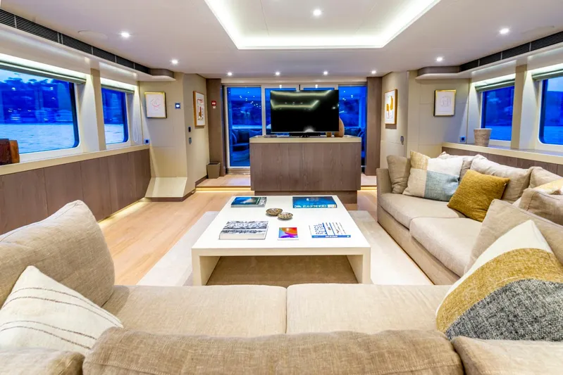 Yacht Photos Pics Luxurious interior of 2001 Heesen 38m yacht with modern decor and comfortable seating.