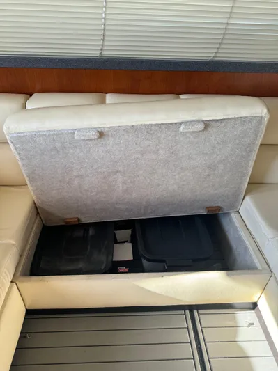 Martin Yacht Photos Pics Luhrs 36 Convertible 2002 boat interior storage compartment with cushioned seating.