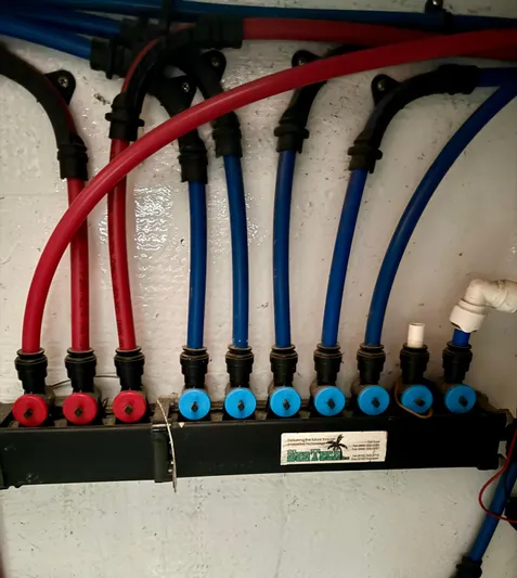 Martin Yacht Photos Pics Wiring system in a 2002 Luhrs 36 Convertible boat, featuring red and blue cables.