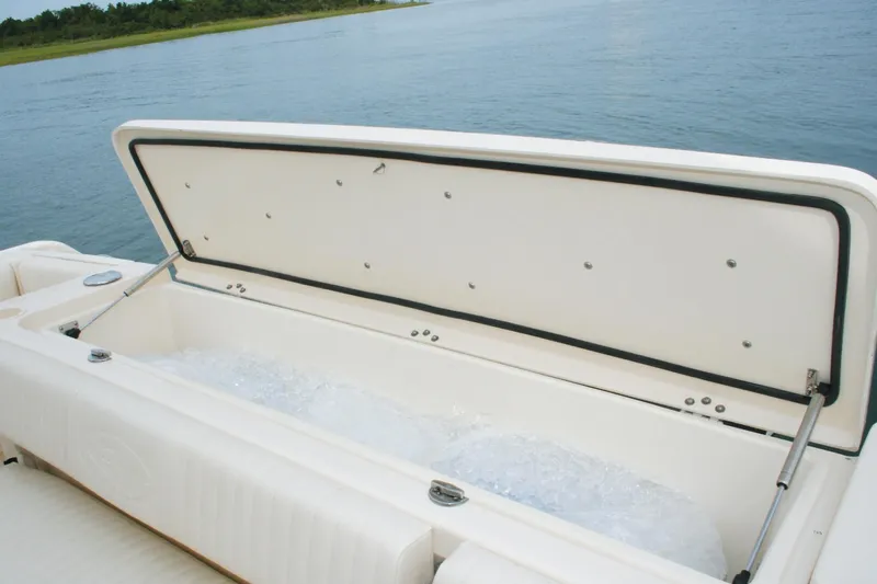  Yacht Photos Pics 2018 Grady-White Express 330 boat storage compartment with open lid.