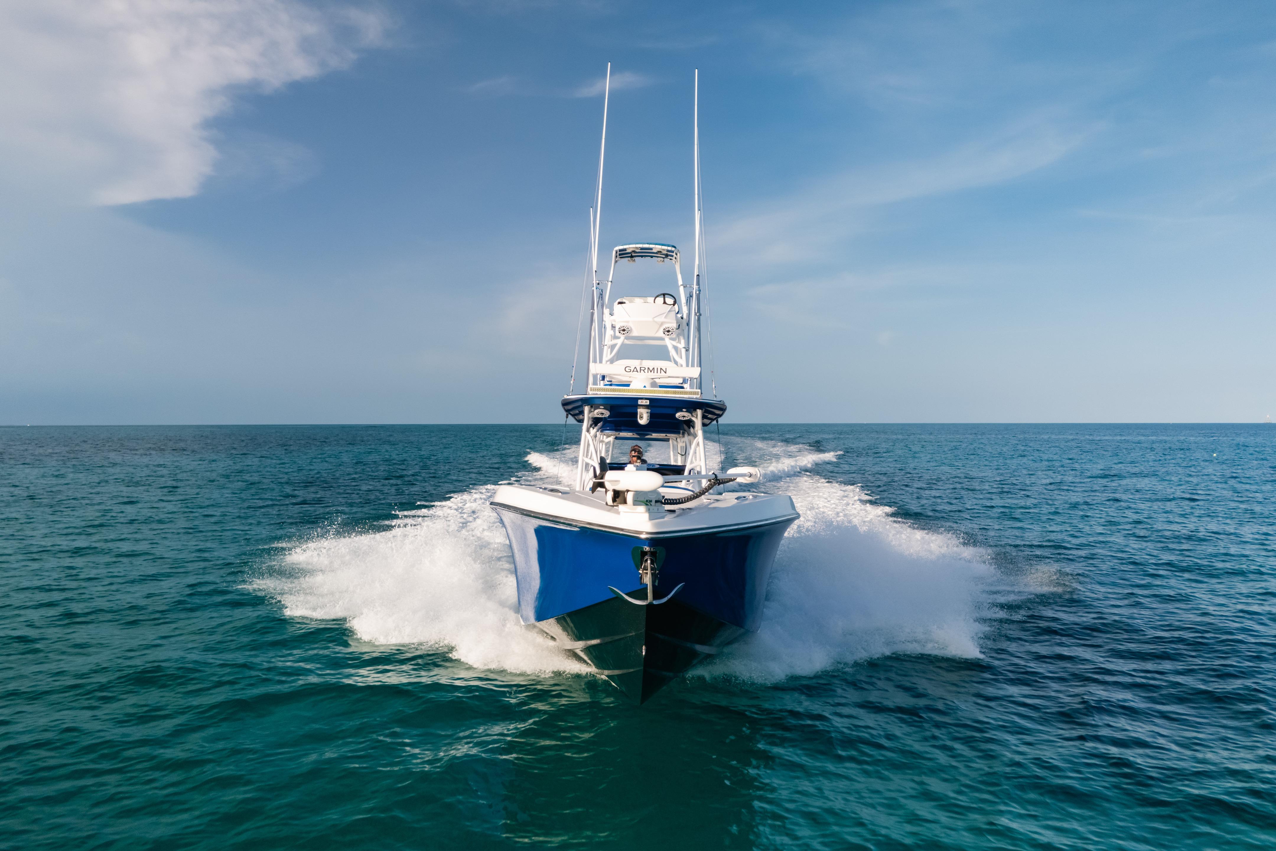 2022 Nor-Tech 392 Super Fish boat cruising on open ocean waters.