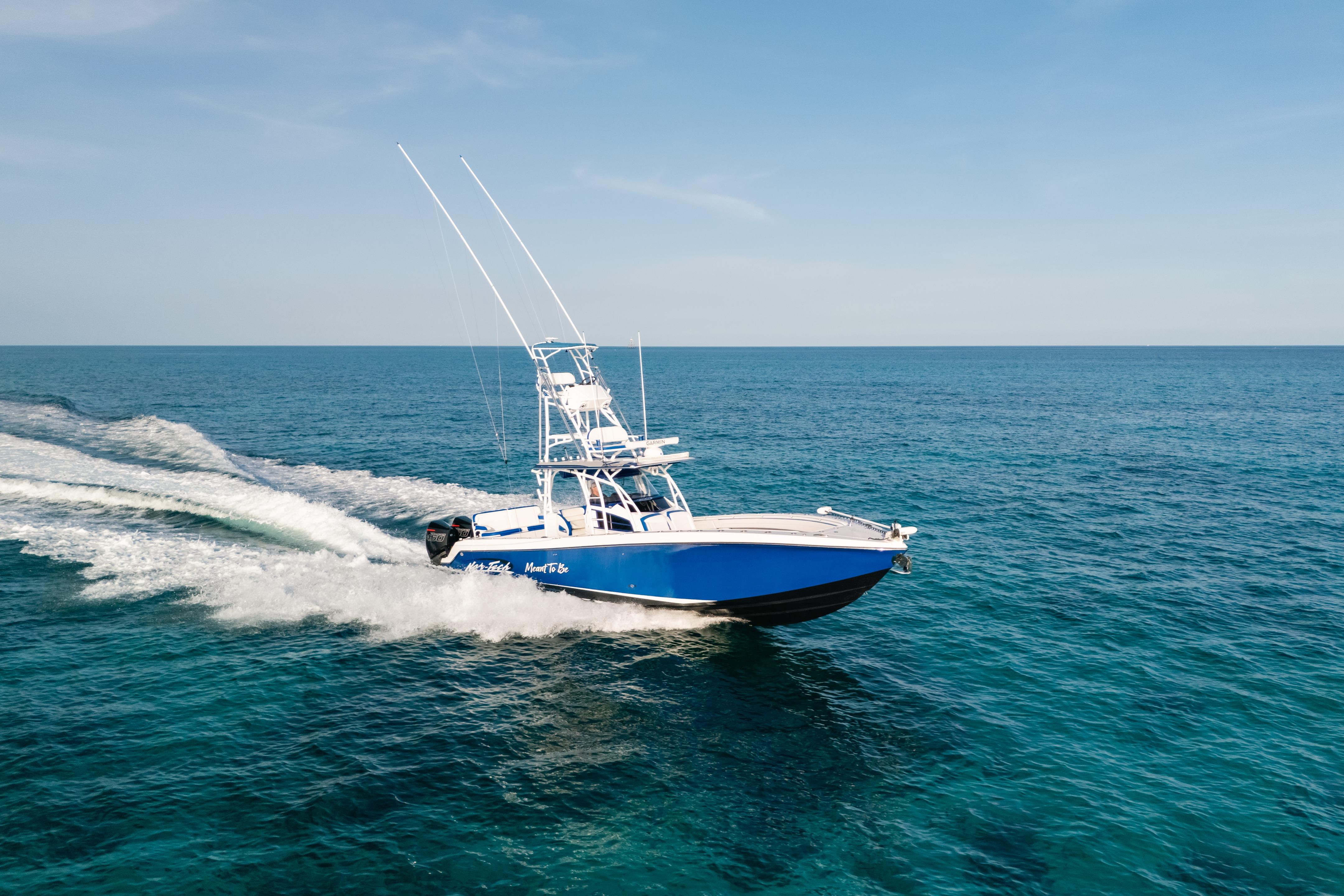 2022 Nor-Tech 392 Super Fish boat cruising on open ocean waters.
