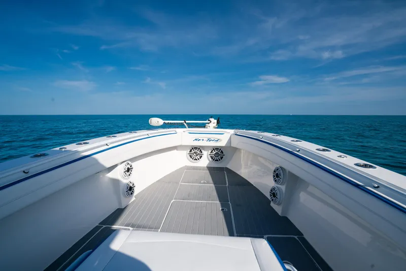  Yacht Photos Pics 2022 Nor-Tech 392 Super Fish boat on open sea under clear blue sky.