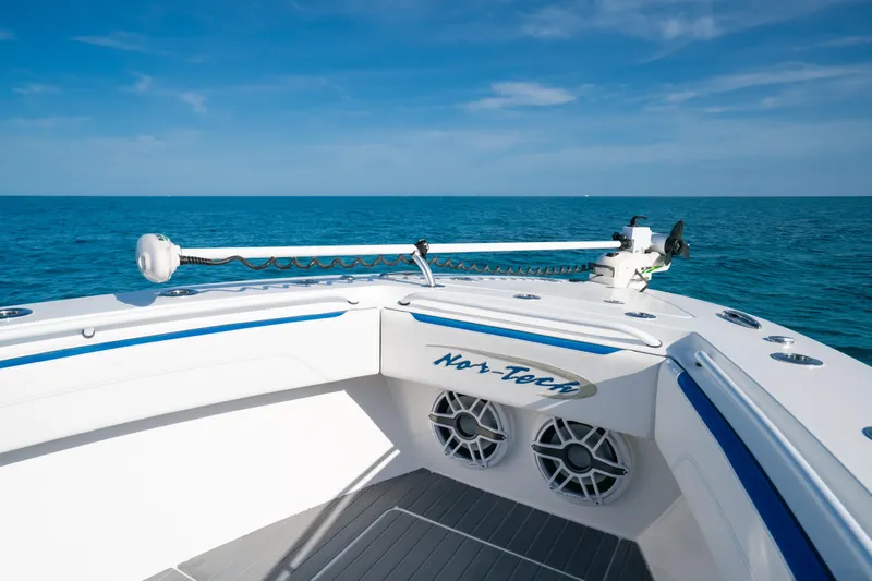  Yacht Photos Pics 2022 Nor-Tech 392 Super Fish boat on open sea, showcasing sleek design and advanced features.