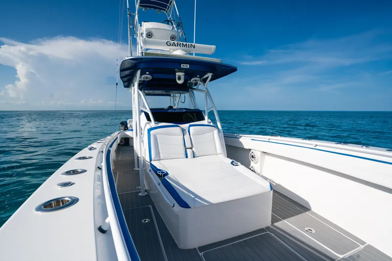  Yacht Photos Pics 2022 Nor-Tech 392 Super Fish boat on open sea under clear blue sky.