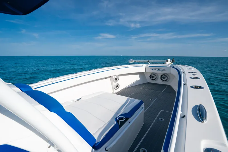  Yacht Photos Pics 2022 Nor-Tech 392 Super Fish boat on open sea, featuring sleek design and spacious deck.