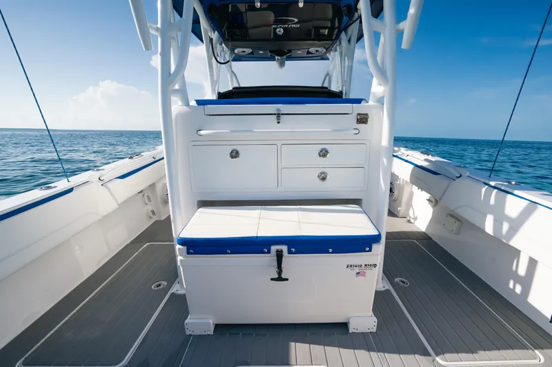  Yacht Photos Pics 2022 Nor-Tech 392 Super Fish boat interior with seating and storage, on open water.