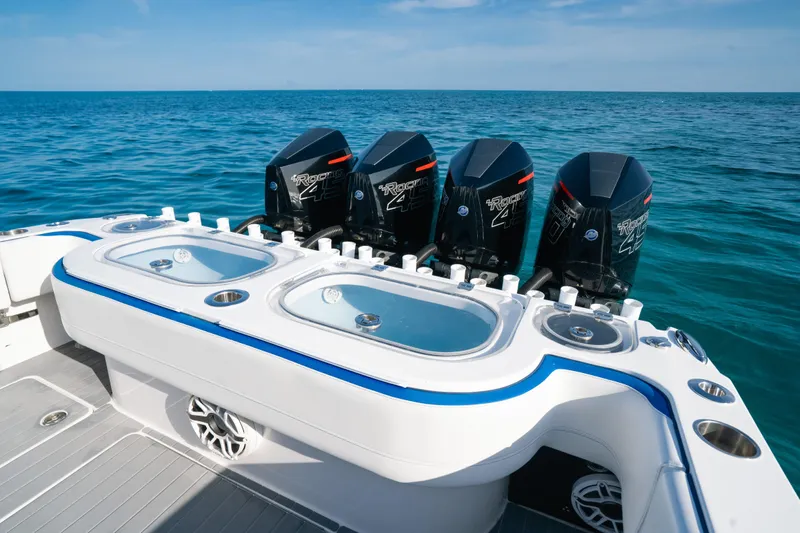  Yacht Photos Pics 2022 Nor-Tech 392 Super Fish boat with quad engines and live wells on open water.