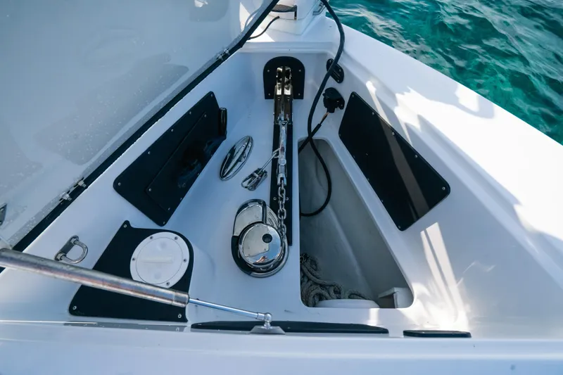  Yacht Photos Pics Anchor compartment of 2022 Nor-Tech 392 Super Fish boat with visible chain and equipment.