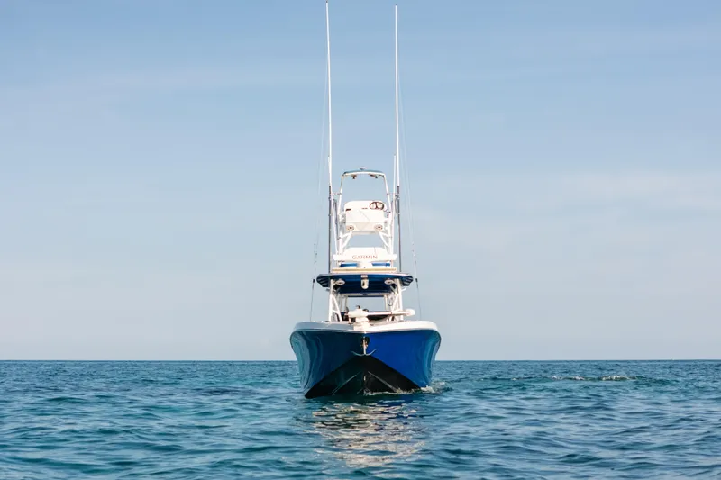  Yacht Photos Pics 2022 Nor-Tech 392 Super Fish boat on open water, front view.