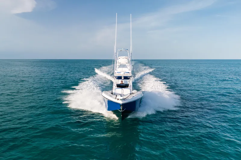  Yacht Photos Pics 2022 Nor-Tech 392 Super Fish cruising on open ocean waters.