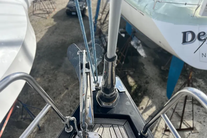  Yacht Photos Pics Bow view of a 2010 Hanse 545 yacht with anchor and rigging.