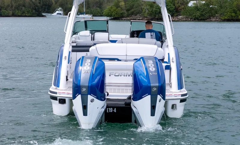  Yacht Photos Pics 2024 Formula 310 BR boat with twin 300 V8 engines on water.