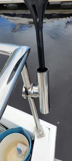 Funky Monkey Yacht Photos Pics Stainless steel boat railing with mounted holder on a 2001 Monk 36 (Hull #215).
