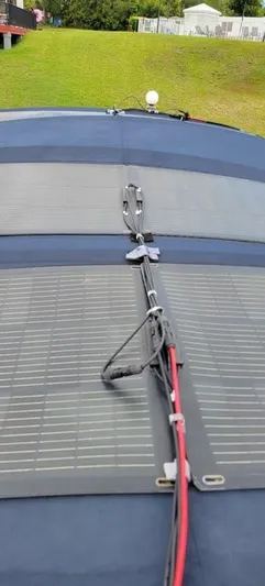 Funky Monkey Yacht Photos Pics Solar panels on Monk 36 boat, Hull #215, 2001 model, with visible wiring.