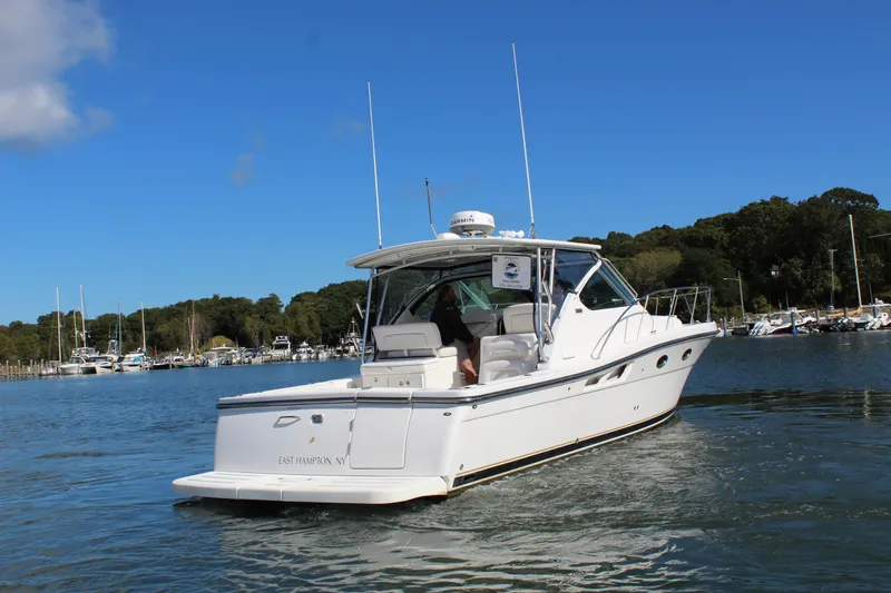  Yacht Photos Pics 2007 Tiara Yachts 3600 Open cruising in a serene marina setting.