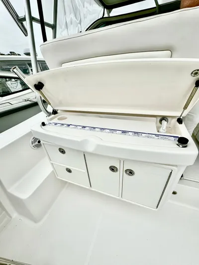  Yacht Photos Pics 2007 Tiara Yachts 3600 Open boat interior with storage compartments and seating area.