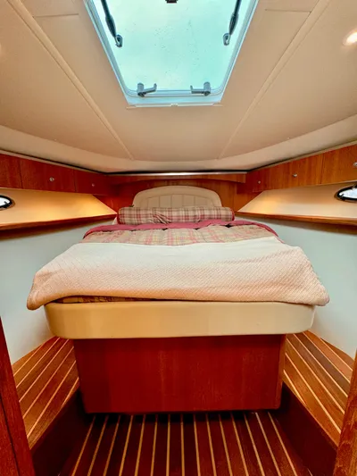  Yacht Photos Pics 2007 Tiara Yachts 3600 Open cabin interior with bed and skylight.
