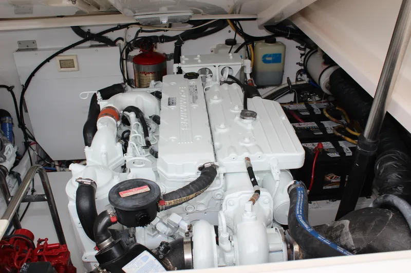  Yacht Photos Pics Engine room of 2007 Tiara Yachts 3600 Open, featuring a well-maintained marine engine.