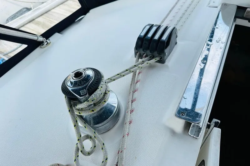 Free Range Yacht Photos Pics Winch and rope system on a 2005 Hunter 44 sailboat deck.