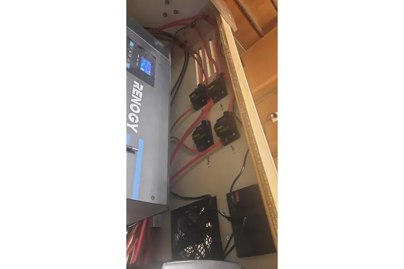 Free Range Yacht Photos Pics Electrical setup with Renogy components in a 2005 Hunter 44 model.