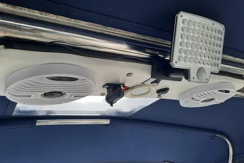 Free Range Yacht Photos Pics Ceiling of 2005 Hunter 44 boat with speakers and LED light panel.