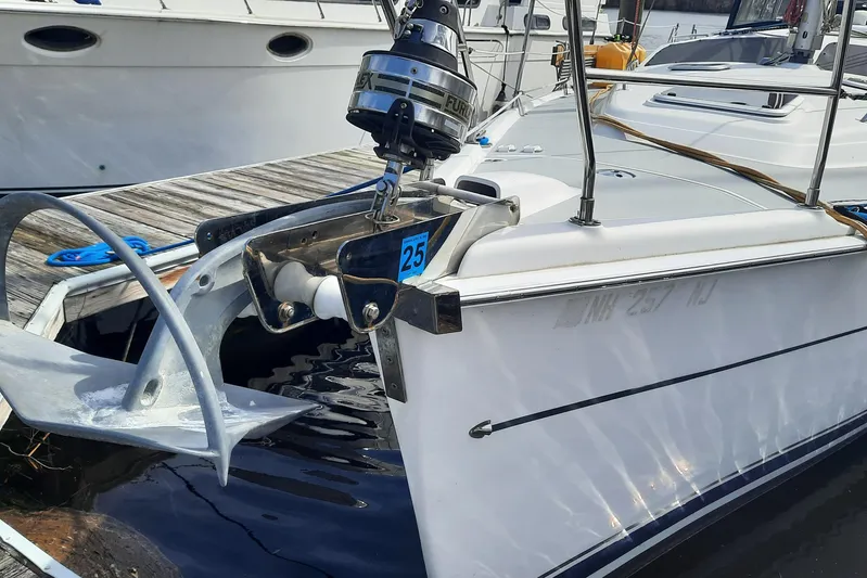 Free Range Yacht Photos Pics Bow of 2005 Hunter 44 sailboat with anchor and docked at marina.