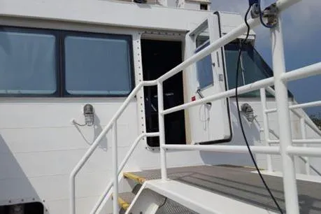  Yacht Photos Pics Crew transport vessel entrance with open door, FBMA Philippines SWATH Slice, 2006 model.