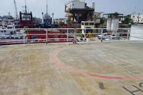  Yacht Photos Pics Helipad on FBMA Philippines SWATH Slice Crew Transport Vessel, 2006, docked at a busy shipyard.