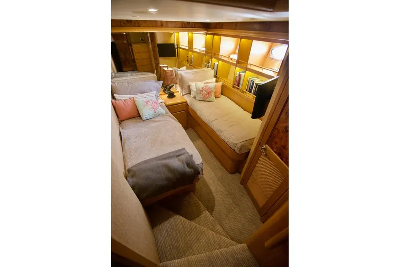 T.t. Amore Yacht Photos Pics Luxurious 2004 West Bay Cockpit Pilot House Motoryacht interior with cozy twin beds and elegant decor.