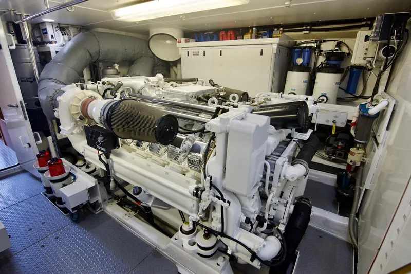 T.t. Amore Yacht Photos Pics Engine room of 2004 West Bay Cockpit Pilot House Motoryacht, featuring advanced machinery and equipment.