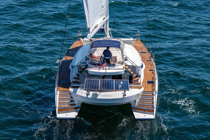 Chasing Waterfalls Yacht Photos Pics Tayana Isara 50 catamaran sailing on open water, 2014 model.