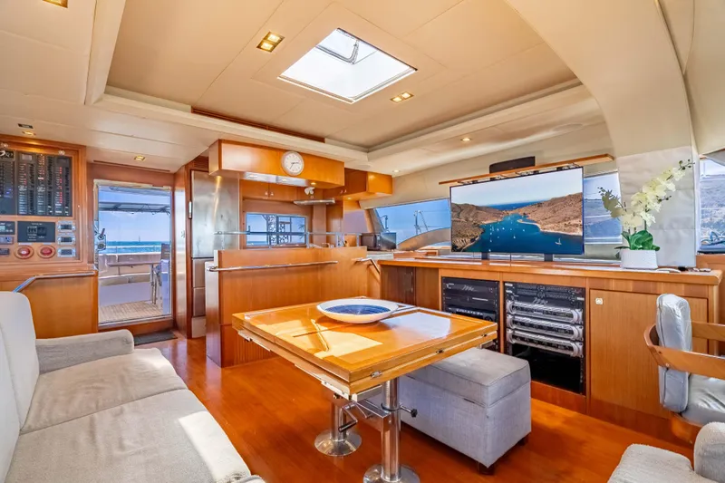 Chasing Waterfalls Yacht Photos Pics Luxurious interior of 2014 Tayana Isara 50 yacht with modern amenities and elegant design.