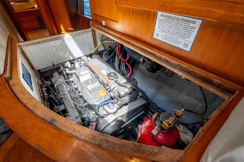 Chasing Waterfalls Yacht Photos Pics Engine compartment of 2014 Tayana Isara 50 sailboat, showcasing detailed mechanical components.
