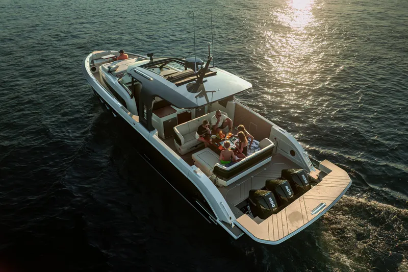  Yacht Photos Pics Luxurious 2025 Wiszniewski Yachts W43 cruising with passengers on a sunny day.