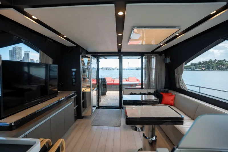 Hard To Get Yacht Photos Pics Luxurious interior of 2019 Azimut S7 yacht with modern furnishings and waterfront view.