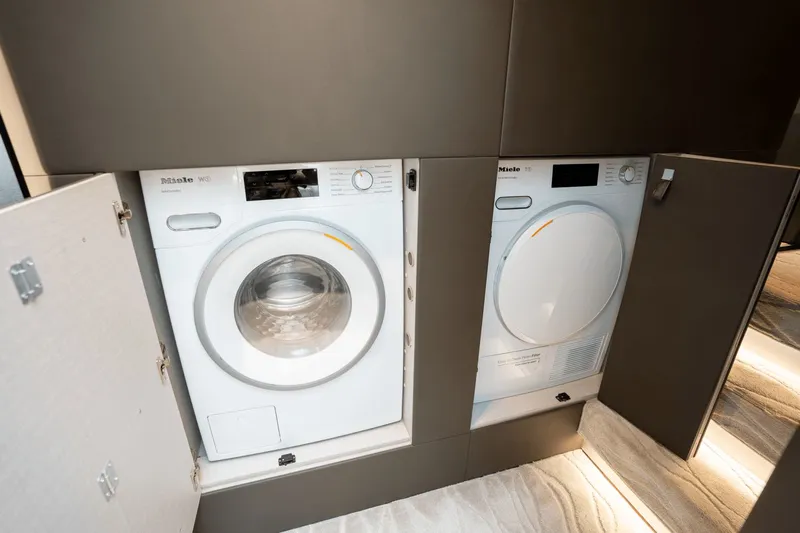 Hard To Get Yacht Photos Pics Laundry appliances in the 2019 Azimut S7 yacht interior.