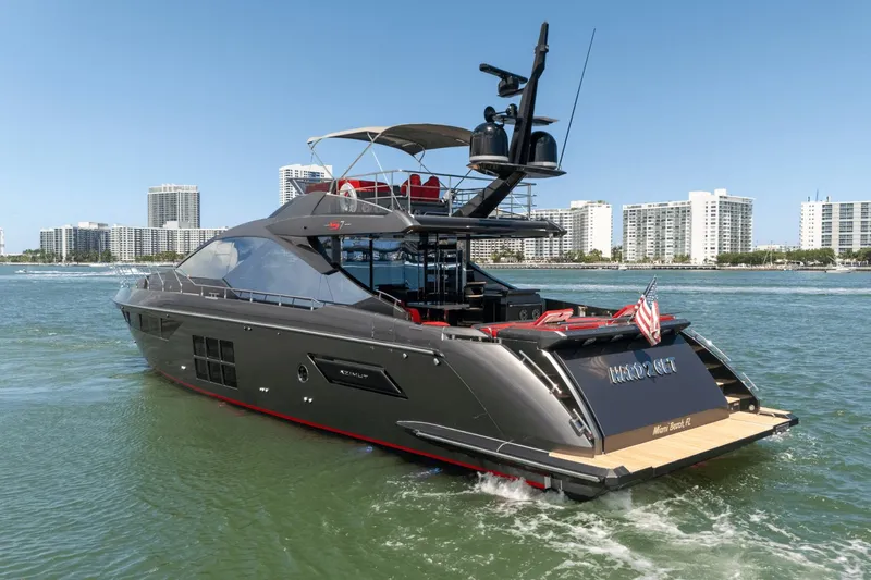 Hard To Get Yacht Photos Pics 2019 Azimut S7 yacht cruising near Miami Beach skyline.