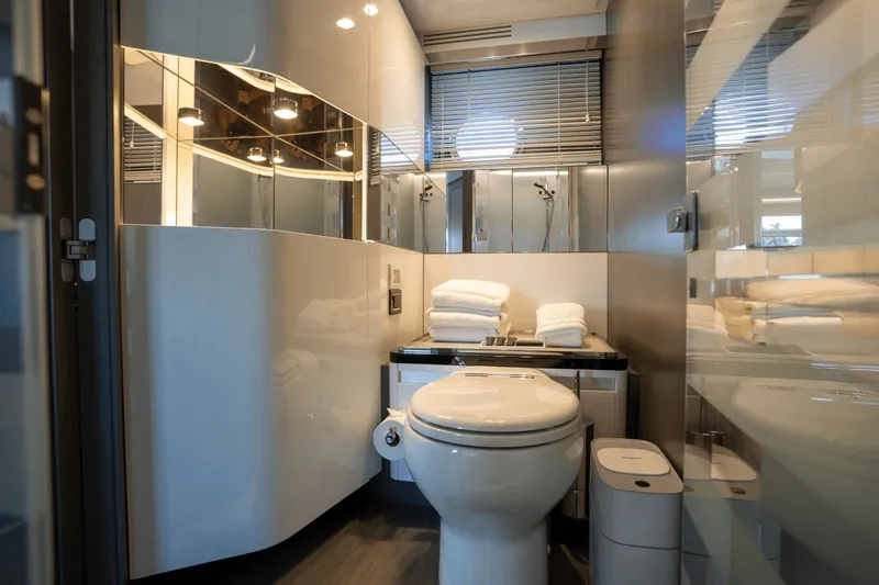 Hard To Get Yacht Photos Pics Luxurious bathroom in 2019 Azimut S7 yacht with modern fixtures and elegant design.