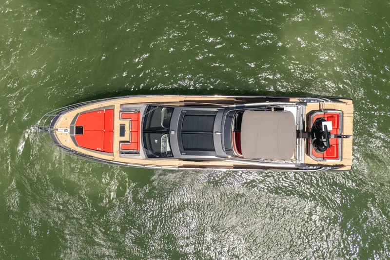 Hard To Get Yacht Photos Pics Overhead view of a 2019 Azimut S7 yacht on green water.