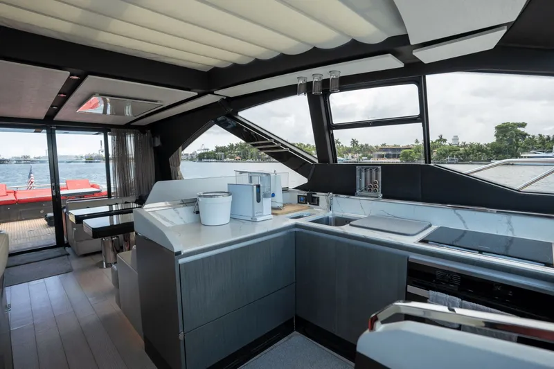 Hard To Get Yacht Photos Pics Luxurious interior of 2019 Azimut S7 yacht with modern kitchen and scenic water view.
