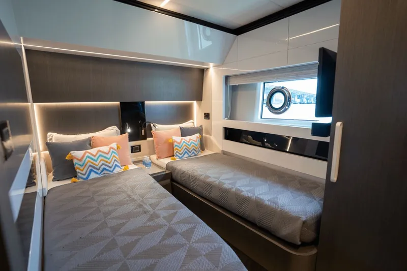 Hard To Get Yacht Photos Pics Luxurious 2019 Azimut S7 yacht cabin with twin beds and modern decor.
