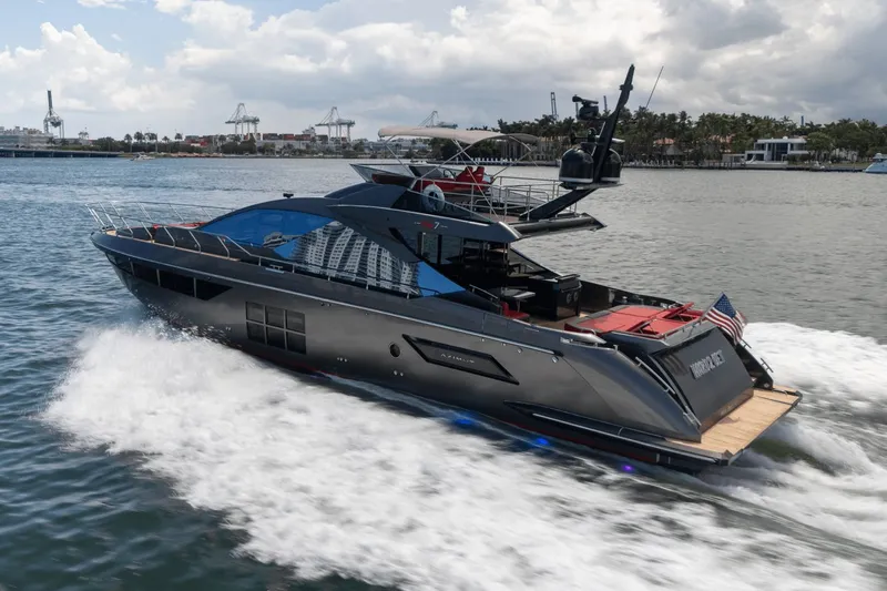 Hard To Get Yacht Photos Pics Luxury 2019 Azimut S7 yacht cruising on water, showcasing sleek design and modern features.