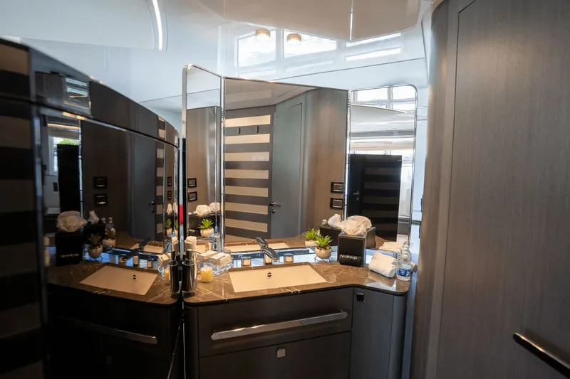 Hard To Get Yacht Photos Pics Luxurious bathroom interior of 2019 Azimut S7 yacht with modern fixtures and elegant design.
