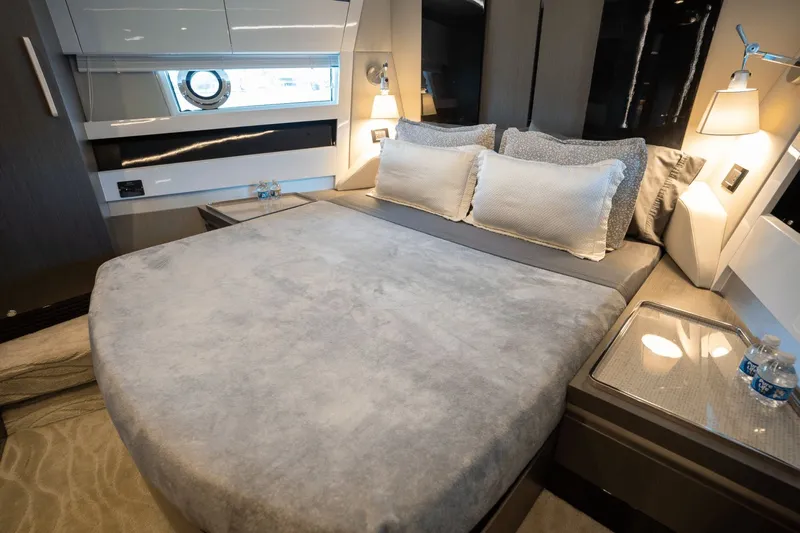 Hard To Get Yacht Photos Pics Luxurious bedroom interior of 2019 Azimut S7 yacht with modern design and cozy bedding.