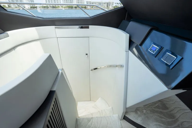 Hard To Get Yacht Photos Pics Interior staircase of 2019 Azimut S7 yacht, featuring modern design and sleek finishes.